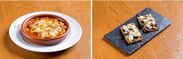 「バル デ エスパーニャ ペロ」(左)カジョス(スペイン風ハチノスの煮込み)のソイチーズ乗せグラタン(税込1,080円)　(右)色々きのこと大豆舞珠ブロックのコカ(税込630円)