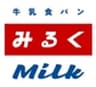 金子乳業有限会社のロゴ