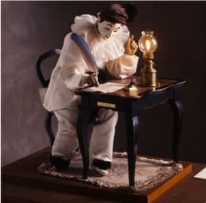 エクリヴァン（自動人形）手紙を書く仕草をするピエロが居眠りをします。再び目覚めた後、消えかけたランプに火を灯し直して、手紙を書く仕草を続けます。