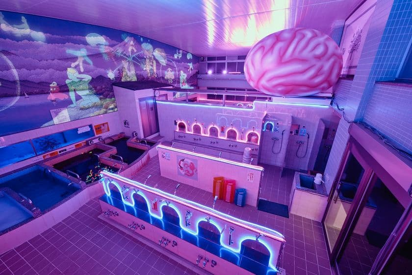 11月26日(水)から12月7日(日)、
大田区蒲田「女塚温泉 改正湯」にて開催！
「脳汁銭湯2025」コンテンツ公開！
「サイバーおかん with 電脳会館」「ギャル電」
「マニアなツアー」「なぞのデザイナー」ら
クセつよクリエイター陣とのコラボレーションで
パワーアップした独創的体験をお届け！