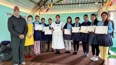 2024年に実施した「ラムチェ村ファッションショー」。グループで紙から服を作り上げるワークショップの優勝チーム。