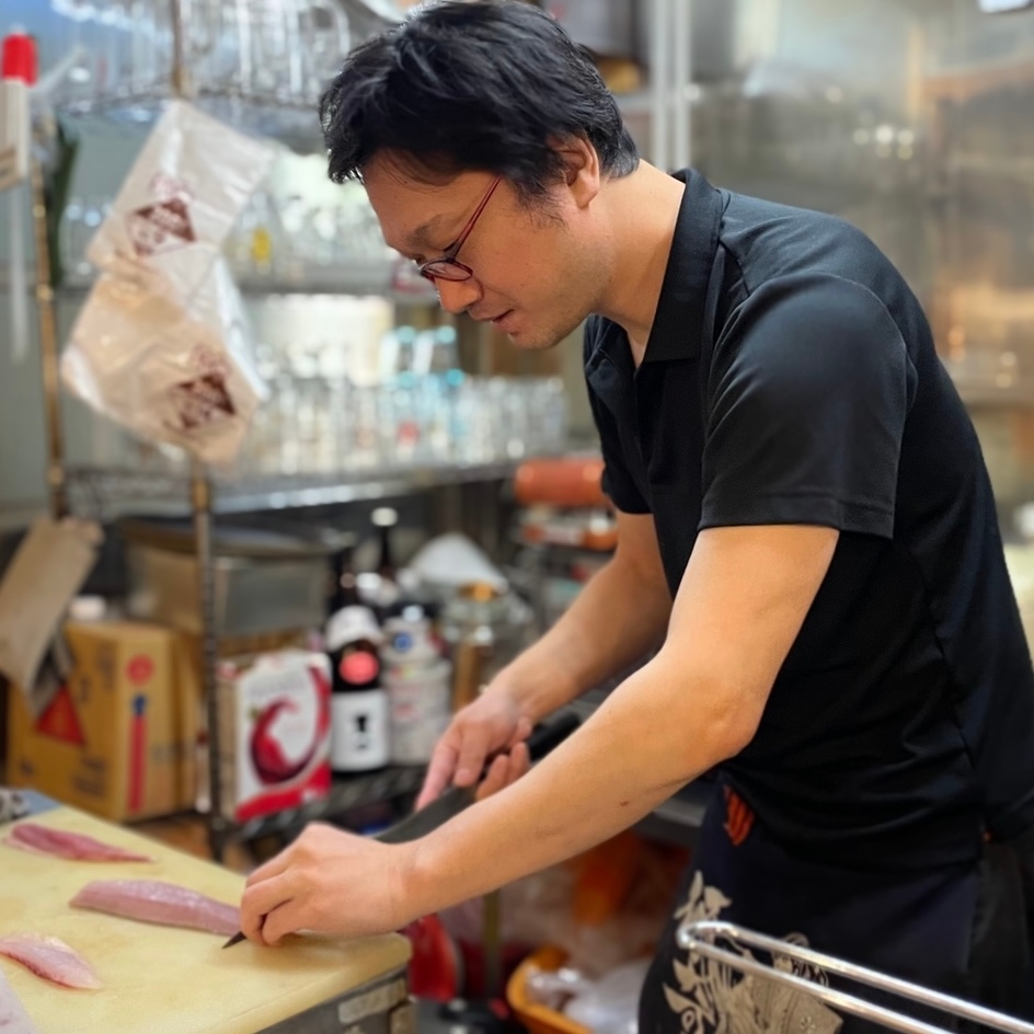 店主の田中さん