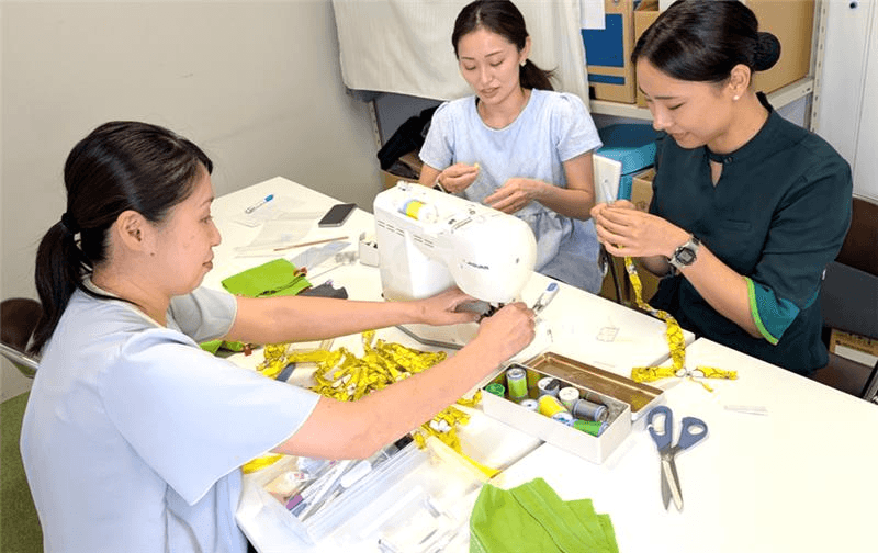 客室乗務員の旧制服を活用したアップサイクル品の機内販売を12月より開始