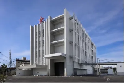 大田区矢口に立つ桂川精螺製作所本社・研究棟。★をモチーフにした会社ロゴが目印（写真提供：桂川精螺製作所）