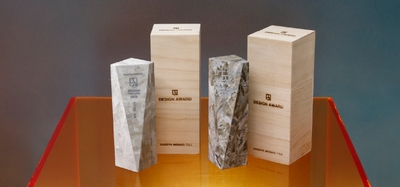 2025年に贈呈されたトロフィーは同社の大理石調タイル｢マルミマキシマム」の新シリーズ「セレナイト」を使用（左：住宅部門 8010P 右：非住宅部門 8020P）。