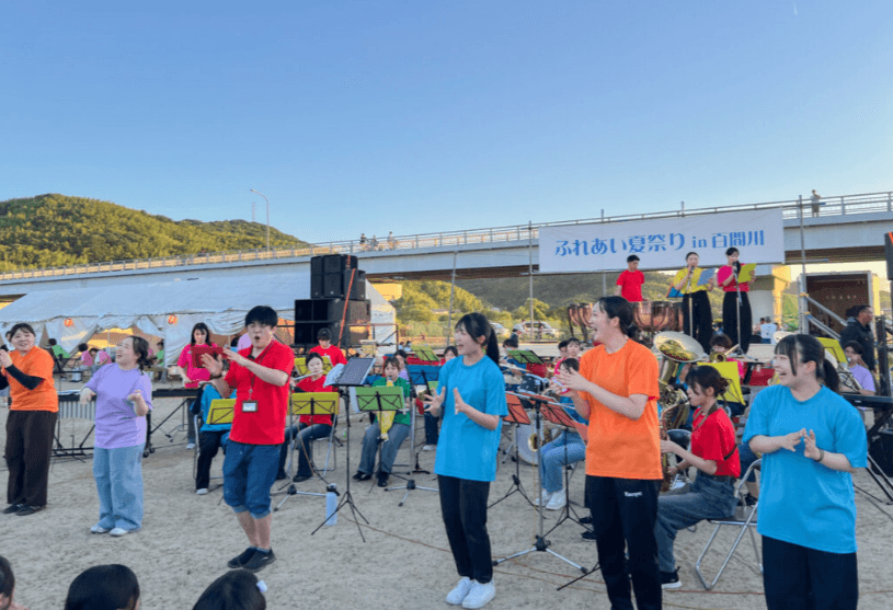 【環太平洋大学】地域に音楽の笑顔を届ける-IPU吹奏楽サークルが「ふれあい夏祭りin百間川」を彩る