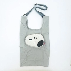 おすましフェイスのポケットがキュートで便利なショッピングバッグ。折りたためるので大きく使えてコンパクトです。