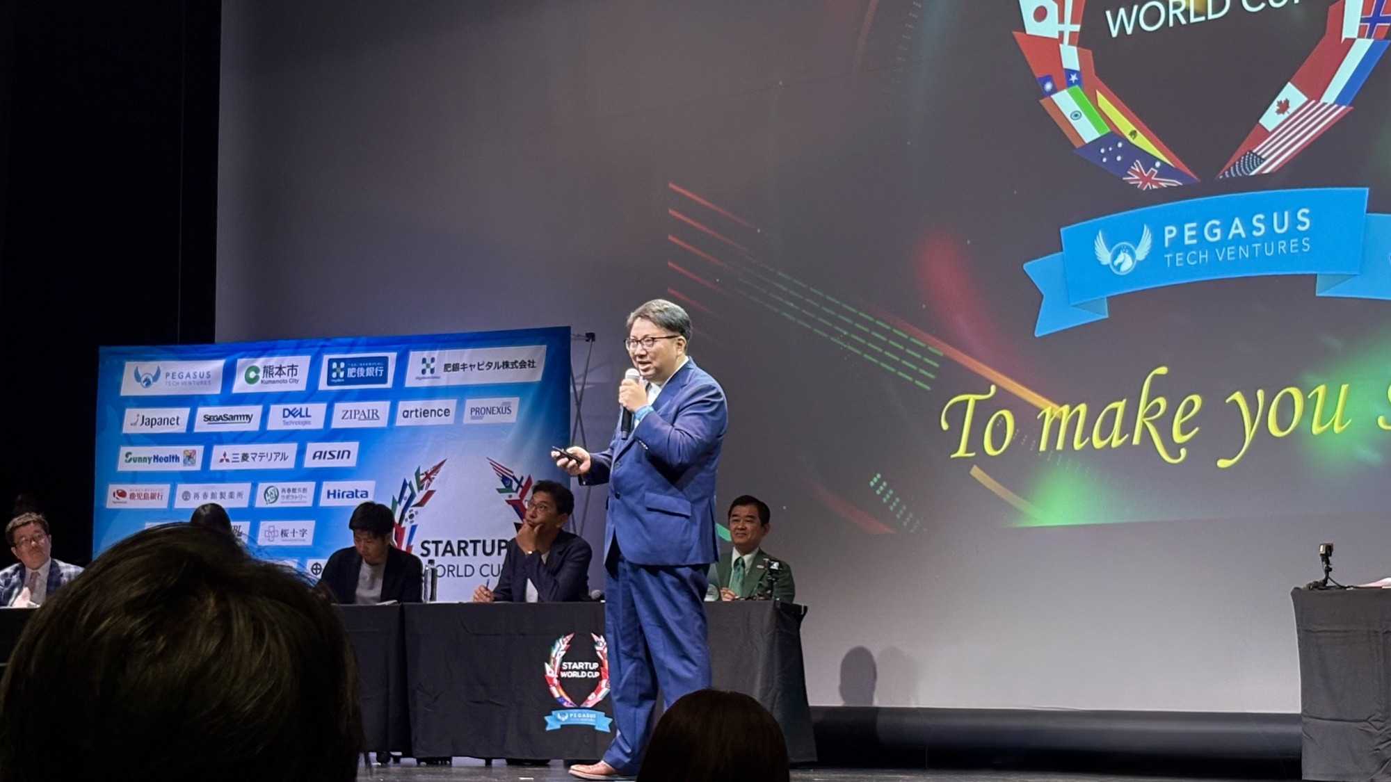 ピッチを行う竹下代表