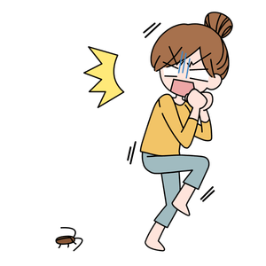 ゴキブリに驚く女性
