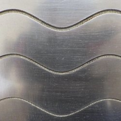 アルゴヴィジョンテクノロジズ、革新的「流体研磨技術」で 半導体製造装置部品の精密仕上げを実現