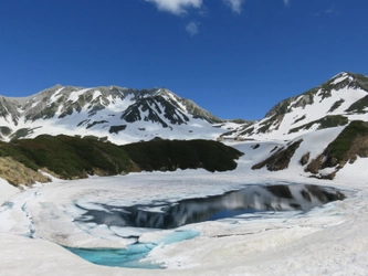 富山県と長野県を結ぶ「立山黒部アルペンルート」の 北アルプスで最も美しい火山湖「みくりが池」雪解け情報を配信！