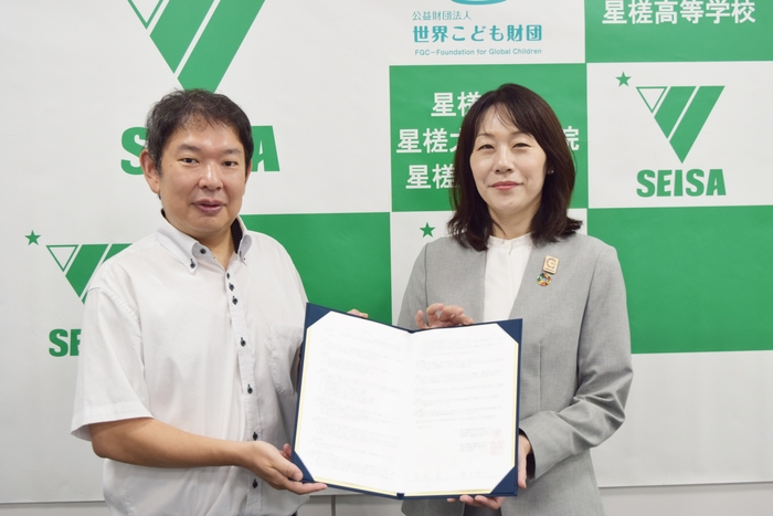 西永副学長(写真左)と藤田理事長(写真右)