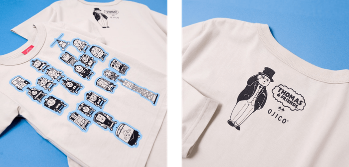 H・A・T・Tのアルファベットの形に整列したきかんしゃトーマスと仲間たち。 みんなを見守るトップハム・ハット卿のバックプリントもポイント。