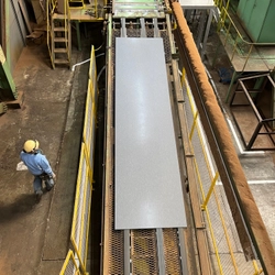 -- 「PANECO®」サスティナブルな環境配慮型建材として本格的な社会実装へ -- 繊維リサイクルボード「PANECO®」がMDF（中密度繊維板）生産設備による世界初の量産試験に成功