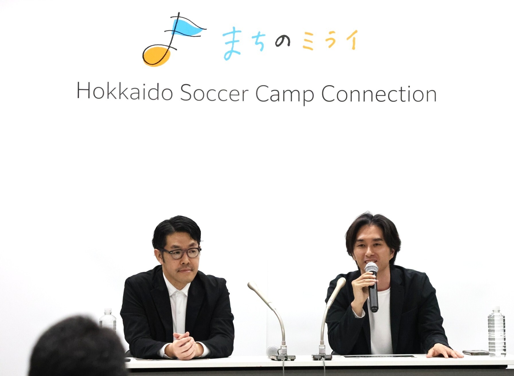 記者発表(右・菅井研副社長/左・渡部 真也特任執行役員)