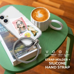 ストラップホールが無くてもストラップを容易に取付けできるメタルストラップホルダーがセットになったシリコンリングハンドストラップを、株式会社PGAが12月13日より新発売