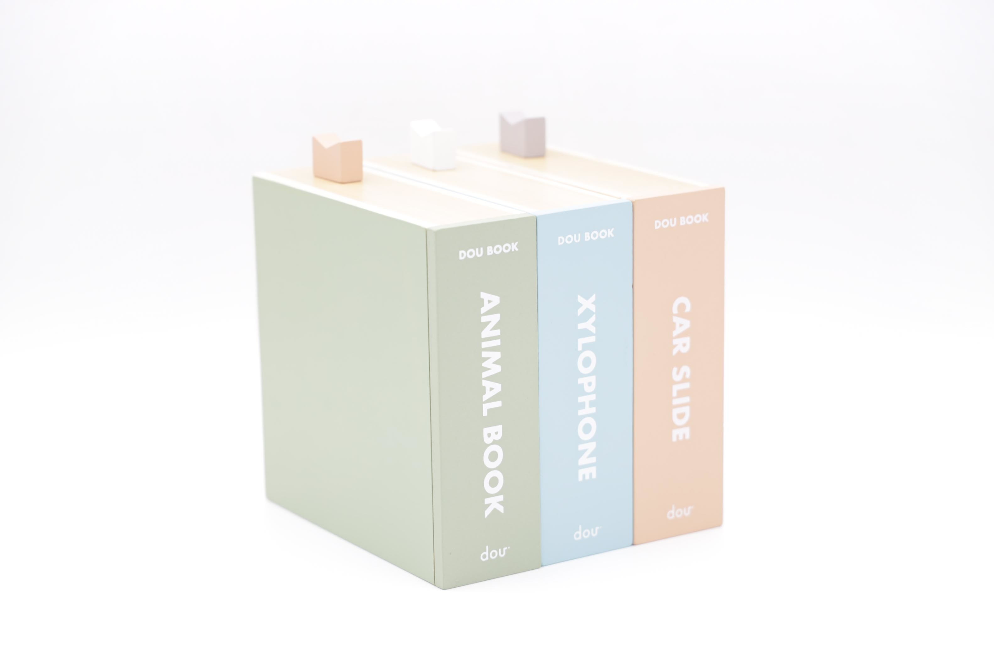 木のおもちゃブランド「dou?」より、本型BOXにおもちゃが入った “DOU