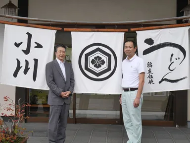 川西委員長(左)・小川 博和さん(右)