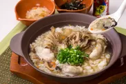 瀬戸内産牡蠣のあっさり雑炊 八幡屋礒五郎の七味添え