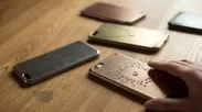 携帯電話カバー(ポリカーボネート)にメタルコーティング(上から銅・錫・真鍮・鉄・ブロンズ)
