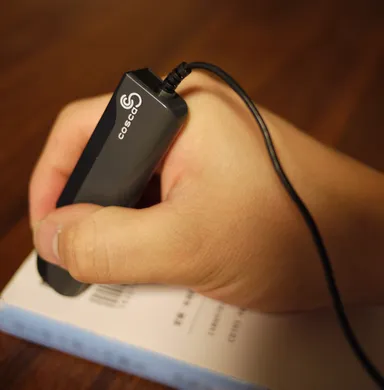 図３．バーコードリーダーによる登録手順　1．パソコンにバーコードリーダーを接続し、所有品のバーコードを読み取る