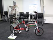 ジャイロ制御による低速時の自転車転倒防止システムを開発　～さいたま市との連携で実現に向けデモ機を展示～