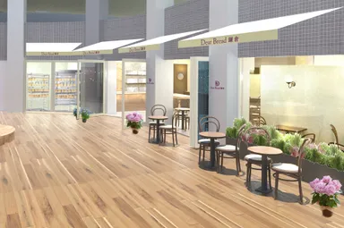 ライブ感あふれるガラス張りのブレッド工房を併設。施設改装でリニューアルされたウッドデッキには、テラス席も完備。