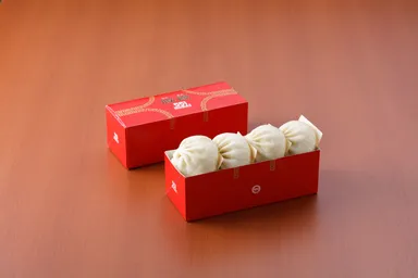 新大阪駅_豚まん4個入り(株式会社蓬莱)