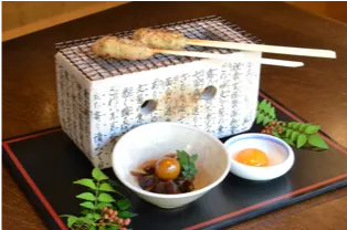 都わすれ「比内地鶏のつくね焼き卵黄添え」