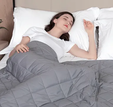 加圧式掛布団が幸福感と安心感を。