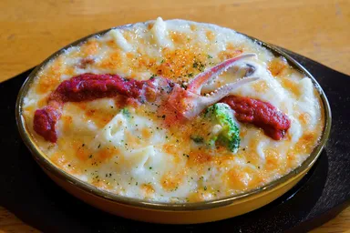 ズワイ蟹とジャージーミルクのペンネグラタン