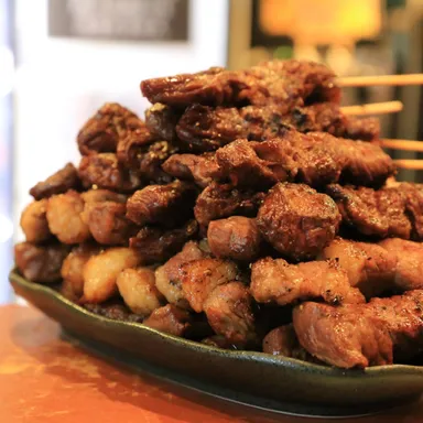 炭火焼き牛串210円(税込)