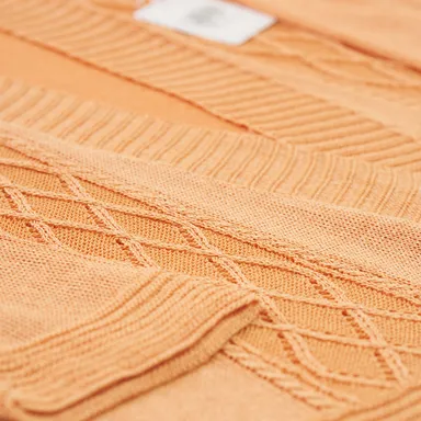 糸からこだわったニット製品