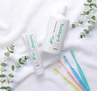 トゥーサップ 薬用歯みがきF MD(左)