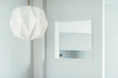 既存壁にも開口を設け、視線や風を通す工夫を行なった。