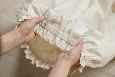 軽量で保温性が高いタイプライター生地を使用