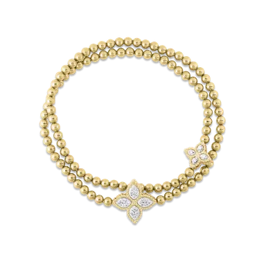 〈プリンセスフラワー〉K18YG／WG・ダイヤモンド ストレッチバングル 税込880,000円