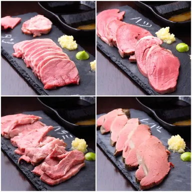 看板メニューの肉刺し全種(タン・ハツ・ハラミ・レバー)