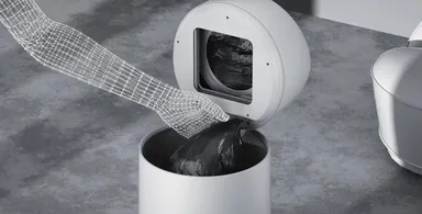 密封されたゴミ袋を取り出す