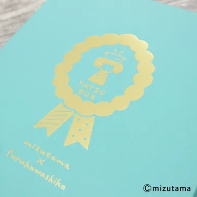 箔押しの箱入り