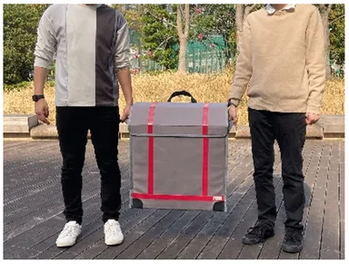 <リュックサック両側面の可搬用取っ手>