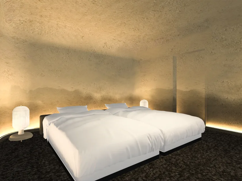 壁面を左官技術で仕上げた寝室