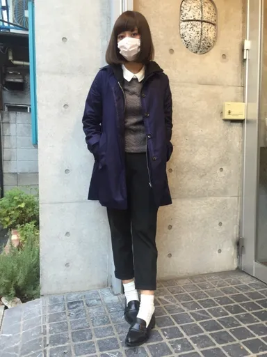 オレンジチェックのマスク着用