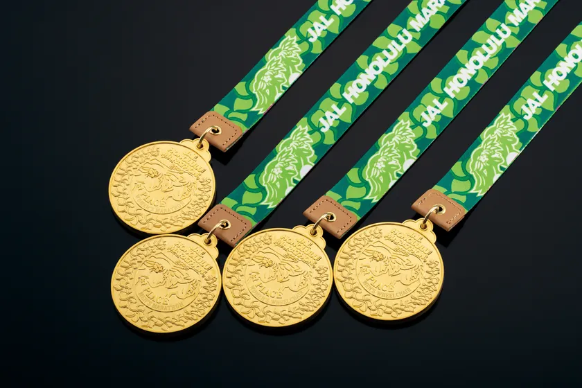 JALホノルルマラソン2025 フルマラソン男女優勝、車いす部門男女優勝メダル