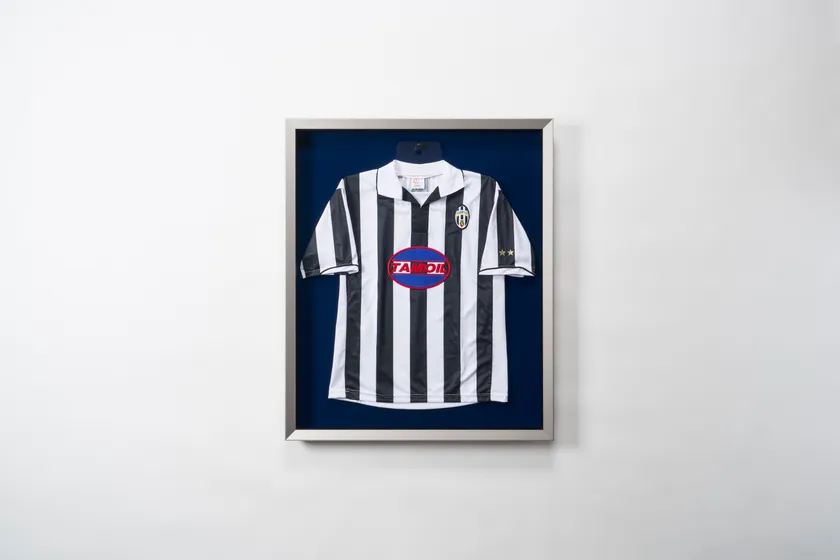 寄贈ユニフォーム額画像