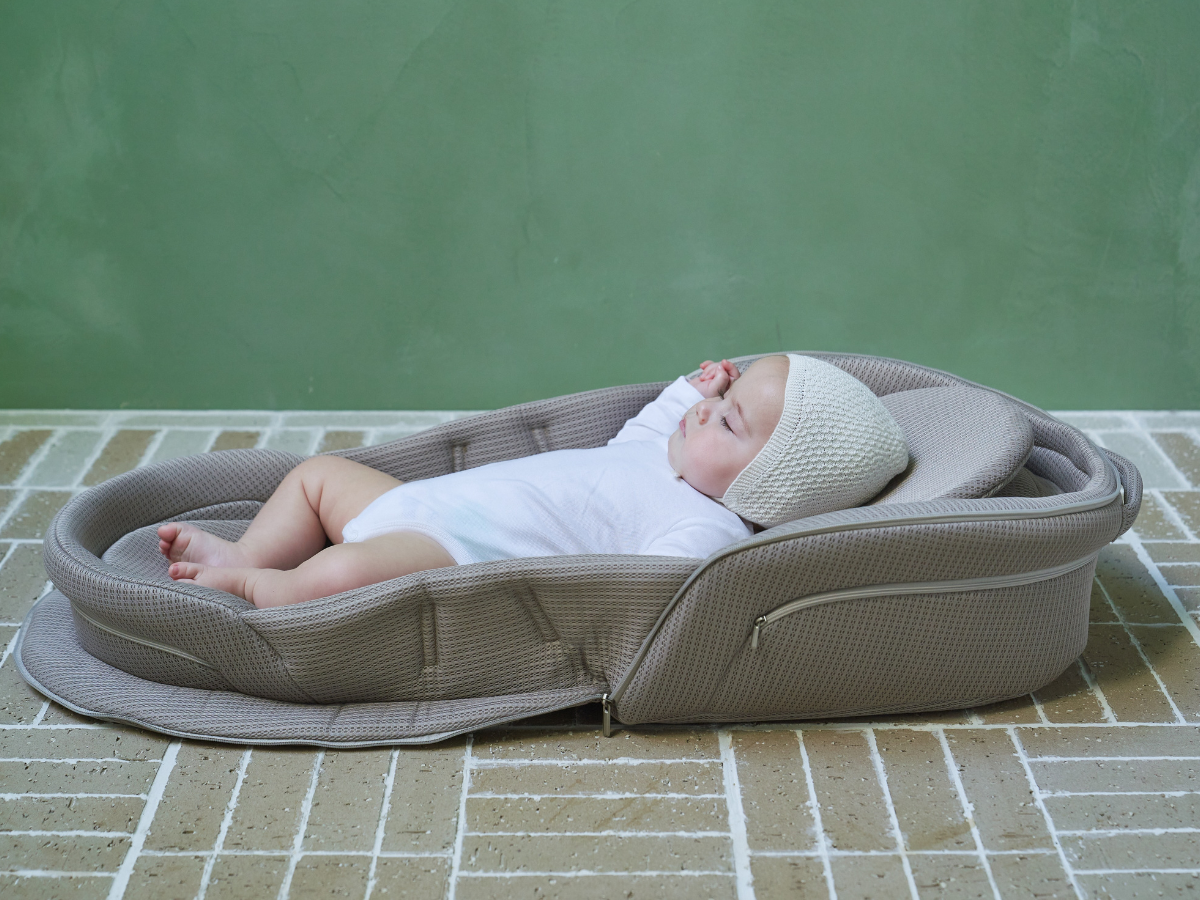 ベビーブランドのネオママイズムが、 返品ベッドインベッドを再活用