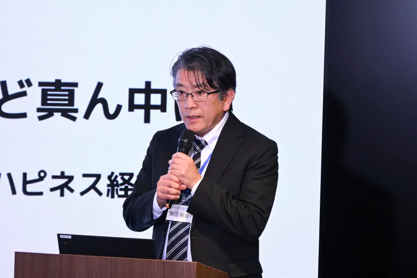 NTTインテグレーション株式会社 グループ経営本部長 鎌田 晃治　登壇の様子