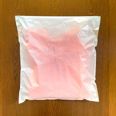 グラスパックXLにトレーナーを入れた様子