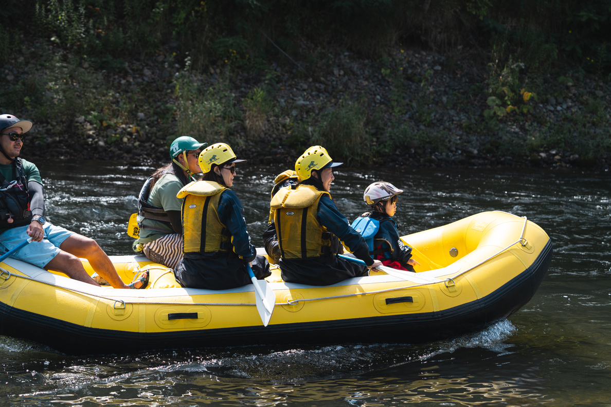 Rafting on the clear water of the Shiribetsu River in Niseko