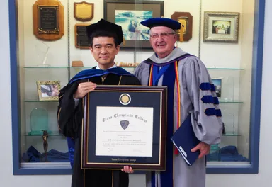 TCC名誉学長でありJCA会長のブラサード氏と岩間 信憲D.C.